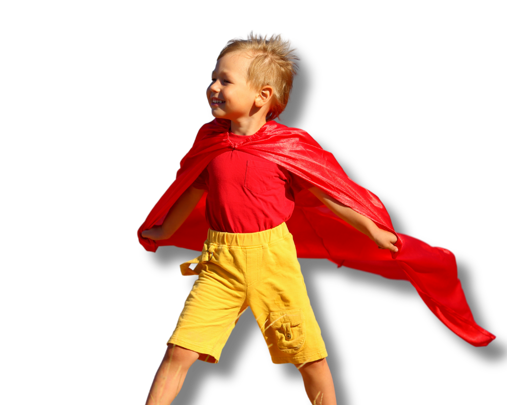 A young child in a red superhero cape striking a hero pose — protection confirmed by a free policy review